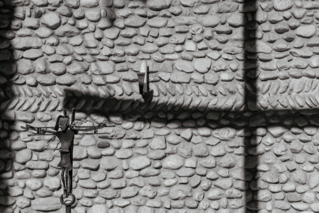 cross with a cross shadow in the background